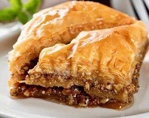 baklava Layers of flaky phyllo pastry filled with rich walnuts and aromatic cinnamon, drizzled with golden honey syrup for a sweet finish.